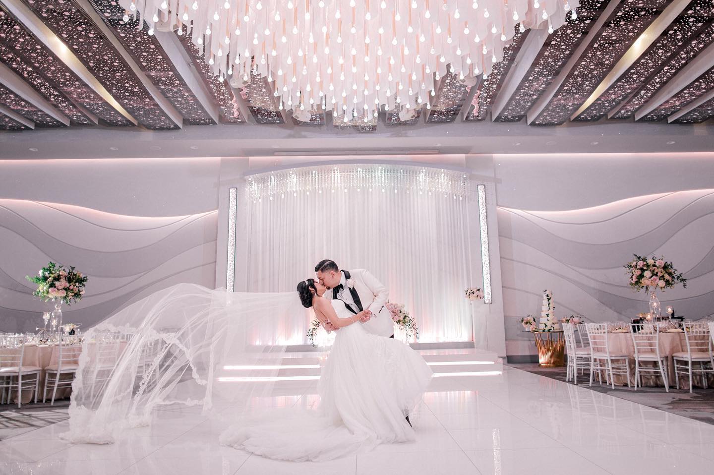 Where To Hold Your Wedding Ceremony In Los Angeles, CA Newlyweds Celebrating Their Love in Modern Ballroom at Metropol in Los Angeles Ca