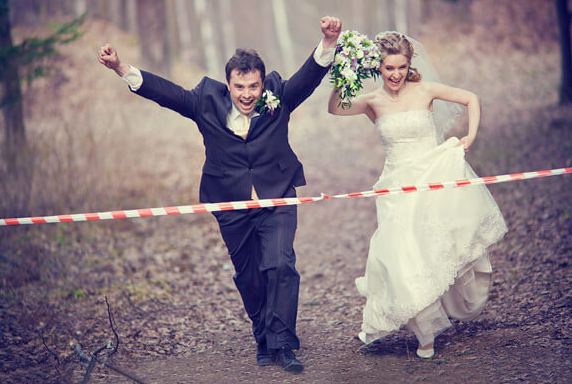 Wedding Reception Entrance - Bride And Groom Crossing Finish Line