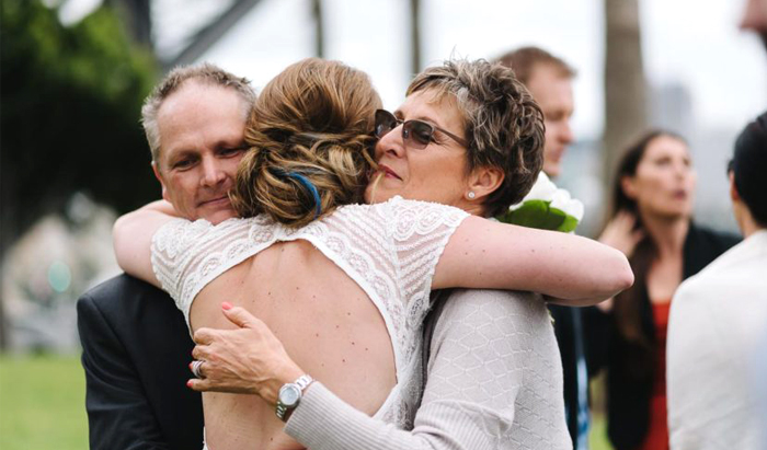 Intimate Event Venue And Small Wedding - Bride Hugging Guests