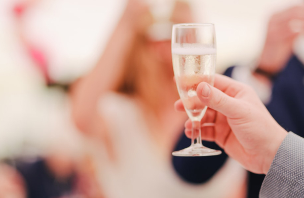 Man Giving Champagne Wedding Toasts