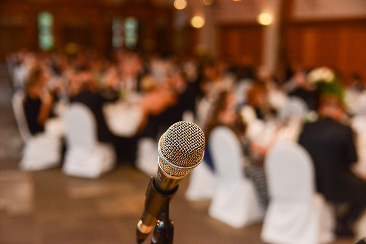Wedding Toasts 101: Advice From Inside The Industry Wedding Toasts - Microphone In Front Of Guests